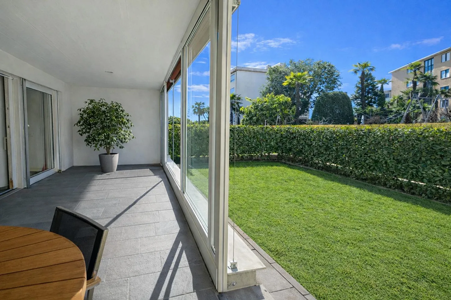 Appartement 4,5 pièces avec jardin d'hiver et jardin privé - Photo 7 sur 24