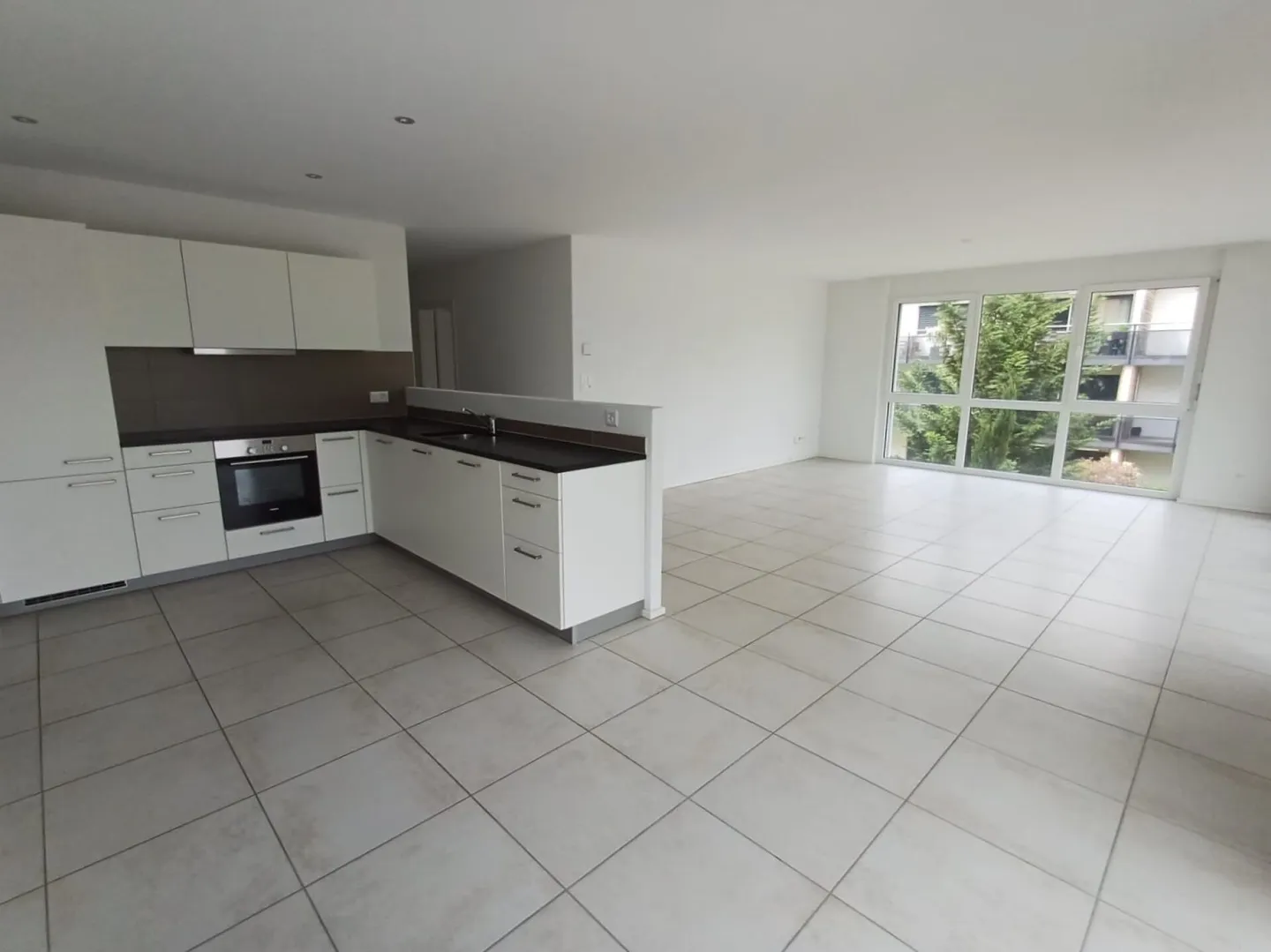 Geräumige Wohnung mit Garten - Foto 2 von 8