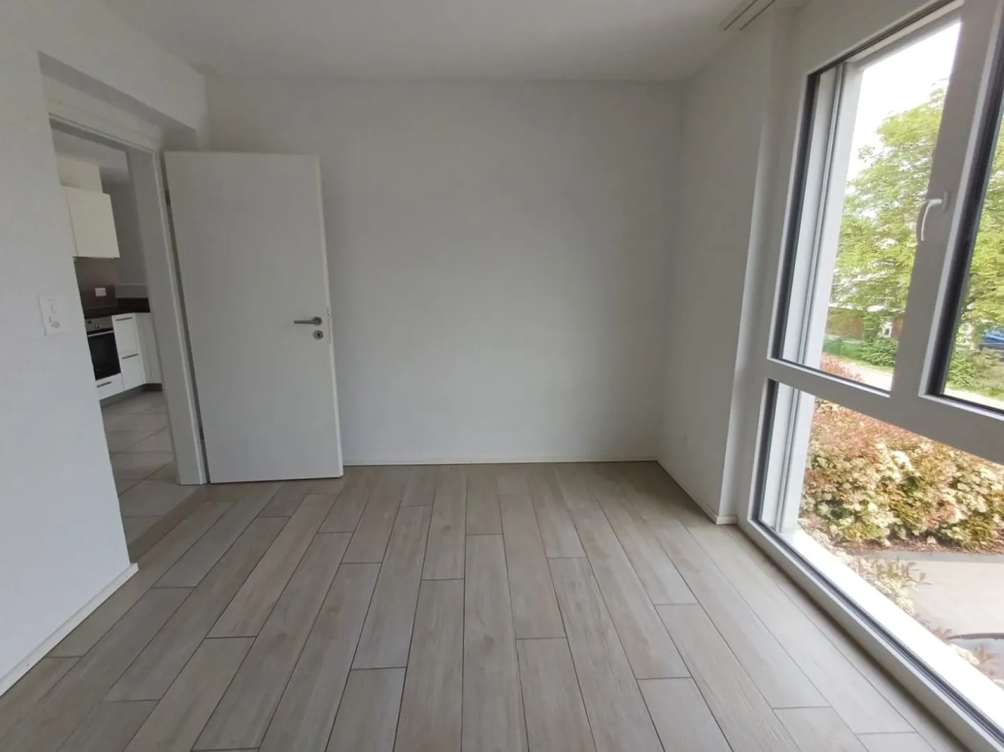 Geräumige Wohnung mit Garten - Foto 4 von 8