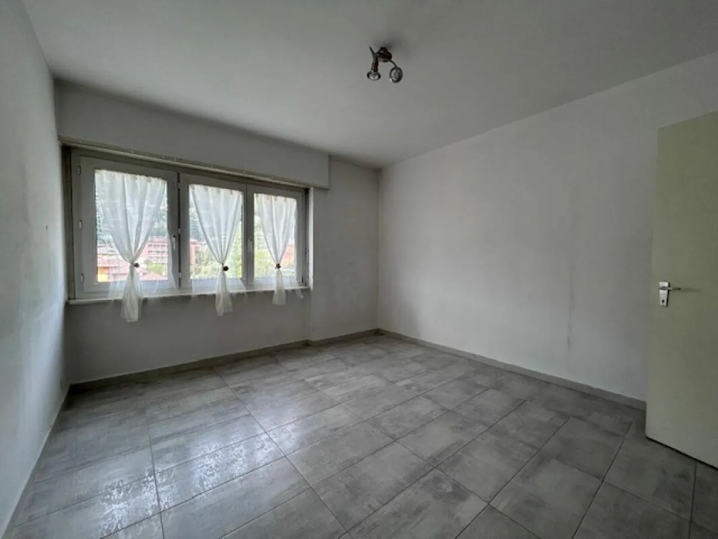 APPARTEMENT 2.5 PIÈCES AVEC GARAGE - EXCELLENT INVESTISSEMENT - Photo 9 sur 17