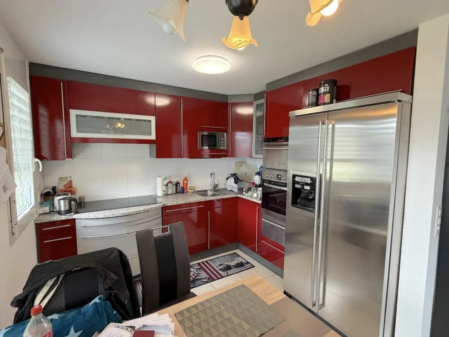 4 ½ Rooms with Balcony on the 1st Floor and 2 Underground Parking Spaces - Photo 3 of 13