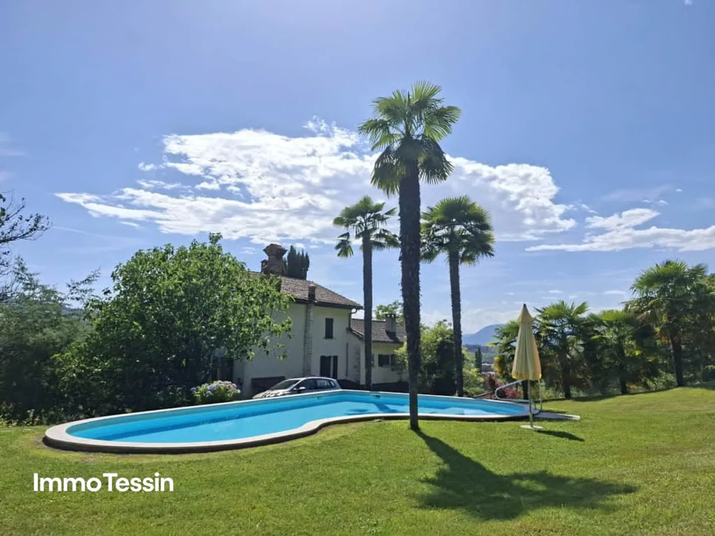OPPORTUNITY: Unique property on over 15,000 m² of land in absolute tranquility with pool and breathtaking views into the Ticino Malcantone - Photo 1 of 13