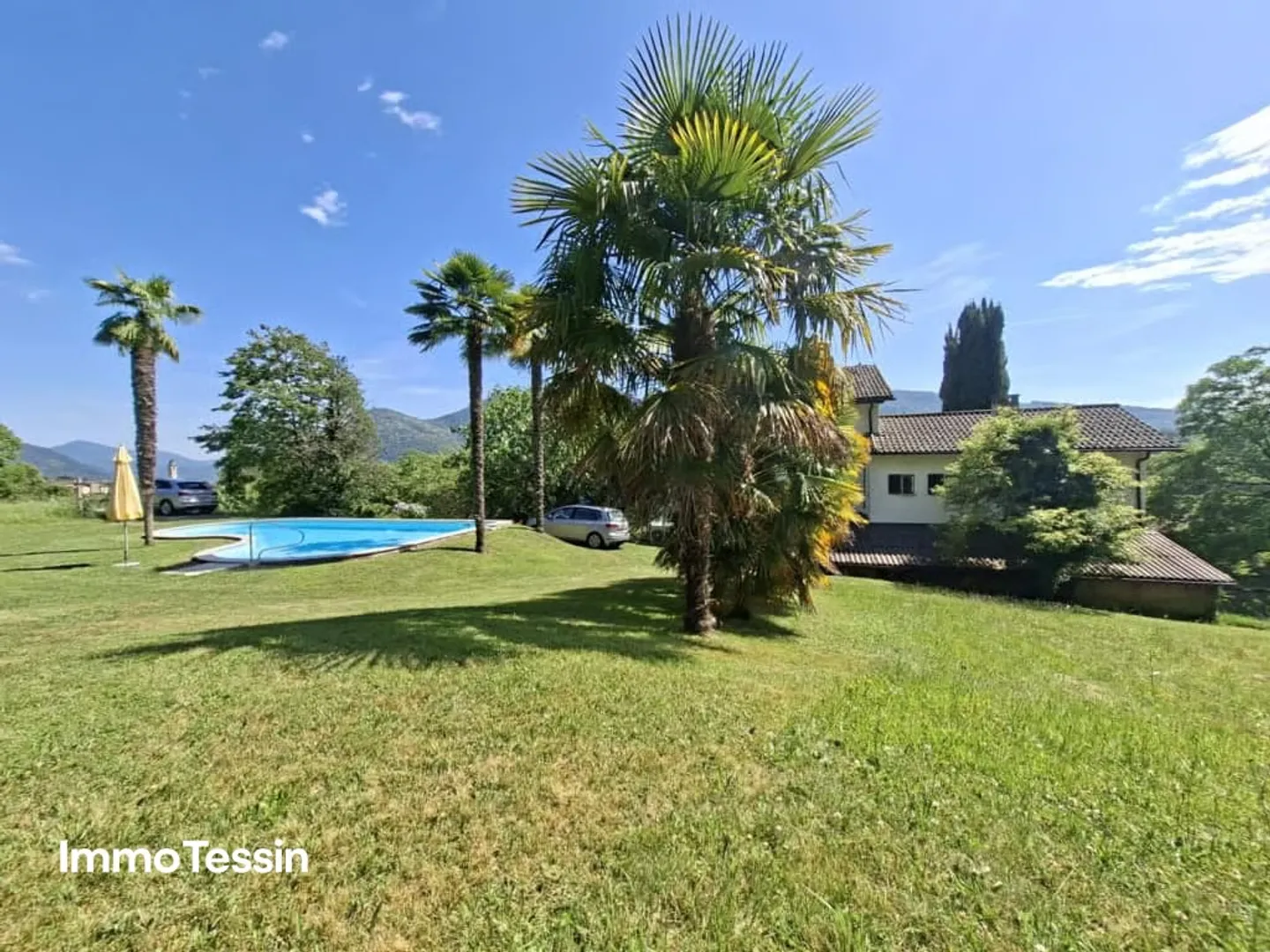 OPPORTUNITY: Unique property on over 15,000 m² of land in absolute tranquility with pool and breathtaking views into the Ticino Malcantone - Photo 2 of 13