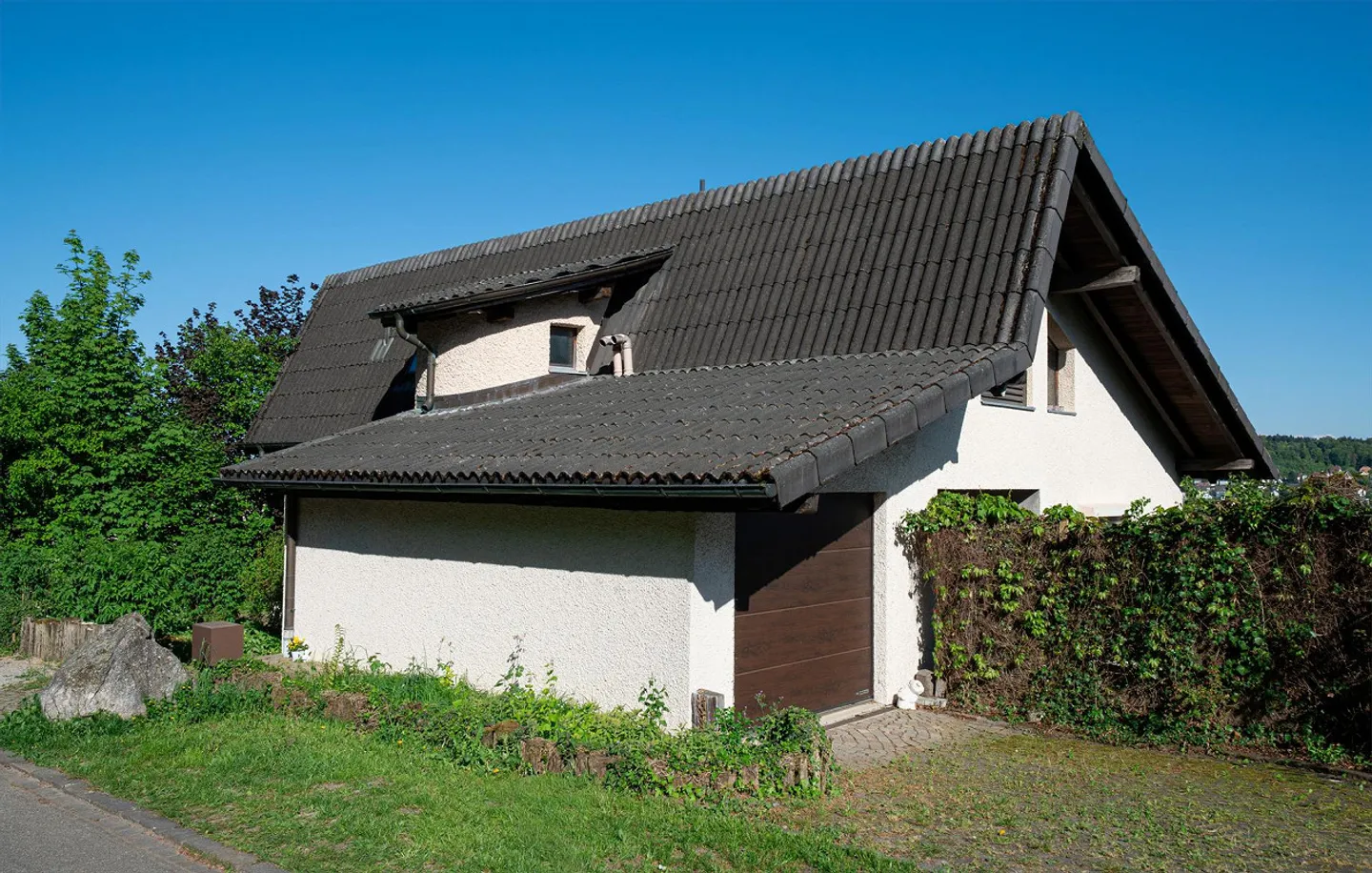 Maison individuelle de 5,5 pièces avec garage, dans un bel emplacement en pente - Photo 4 sur 10