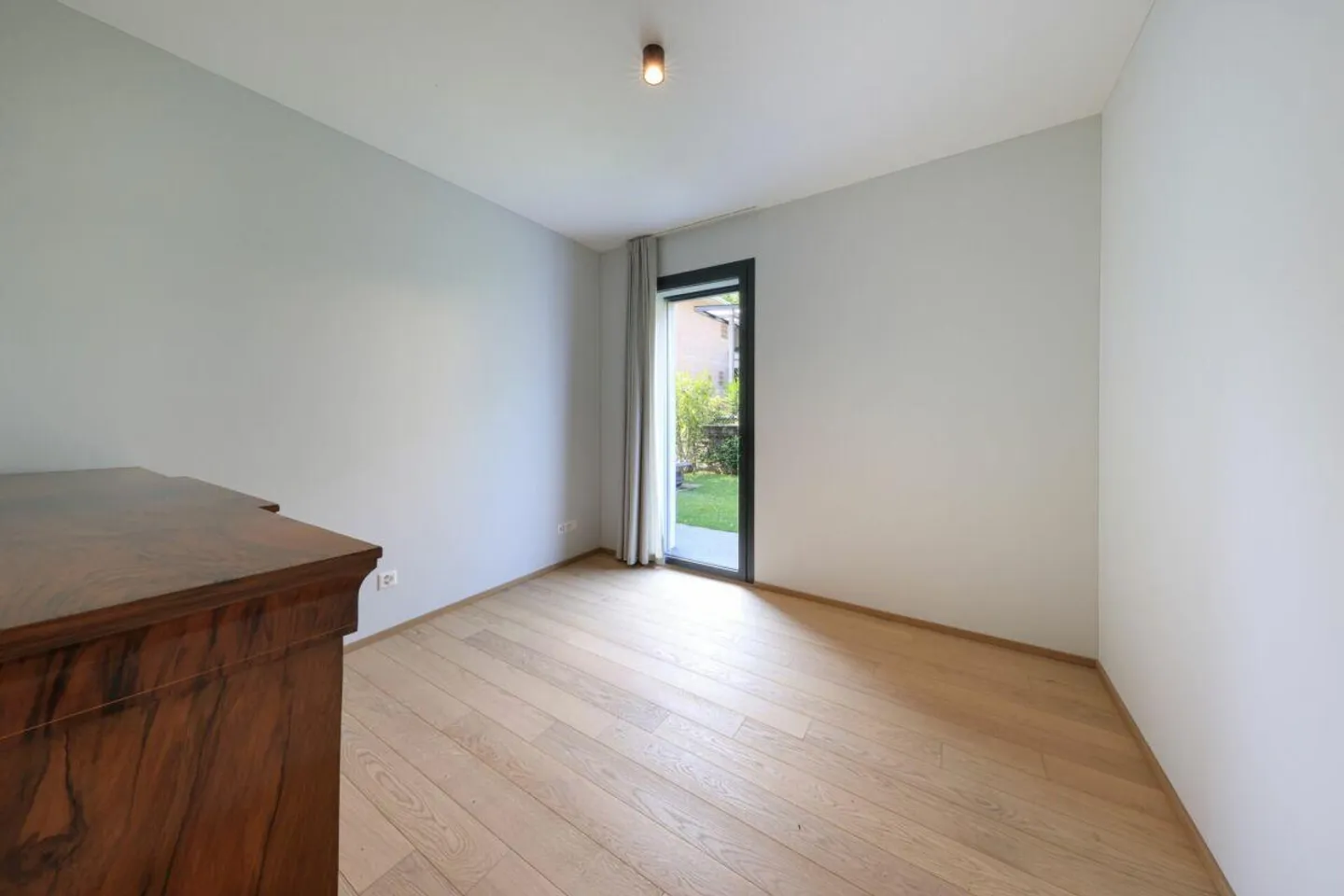 Moderne Wohnung mit privatem Garten - Foto 13 von 17