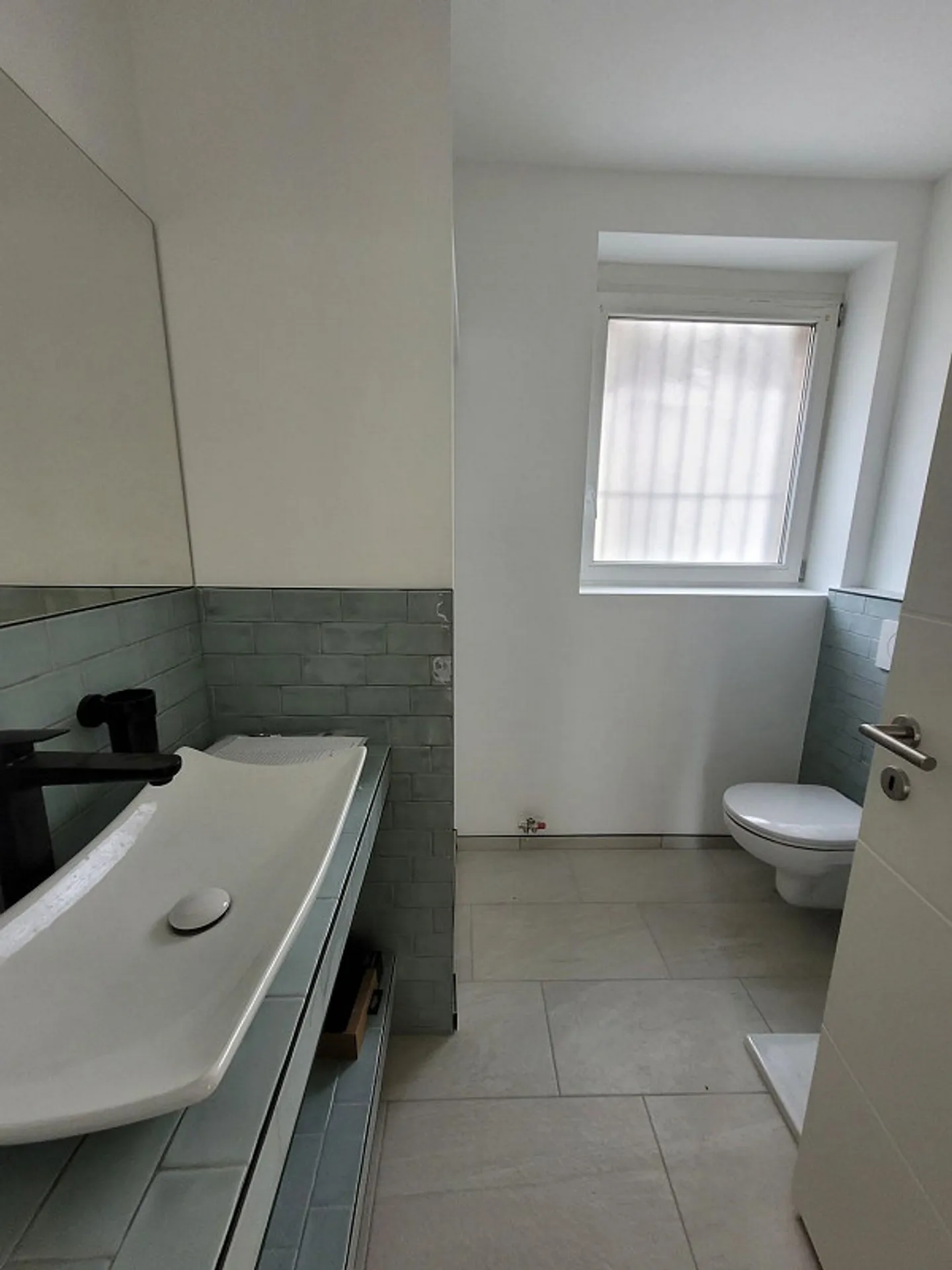 Gioiello appena ristrutturato: Moderno appartamento al piano terra di 3,5 stanze con patio - Foto 4 di 10