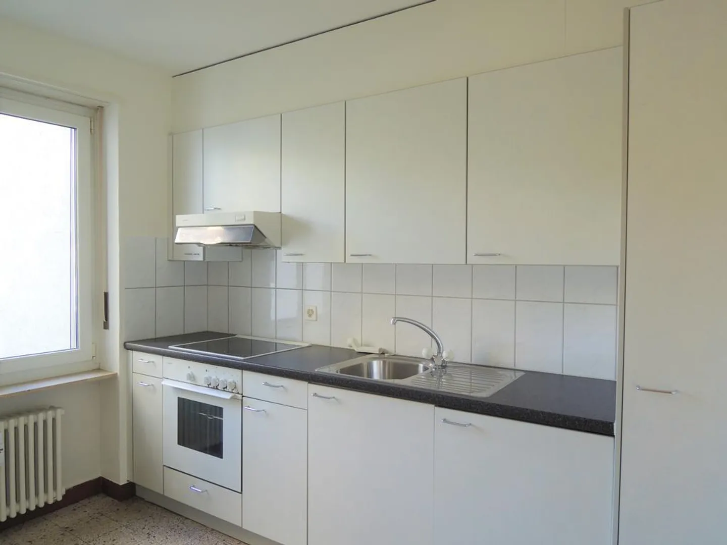 COZY LIVING IN A CENTRAL LOCATION - Photo 2 of 5
