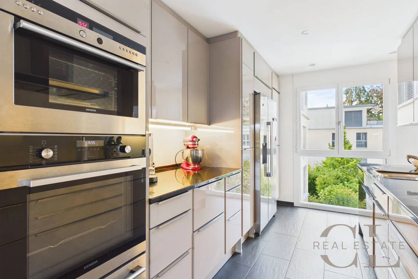 Appartement de 5,5 pièces dans un emplacement dégagé avec deux places de stationnement - Photo 9 sur 23