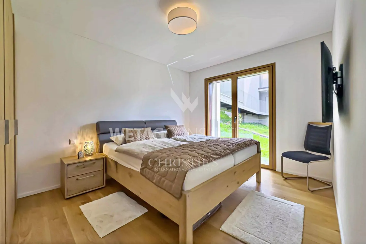 Residenza Cedrus: Appartamento moderno con giardino e vista lago mozzafiato - Foto 7 di 13