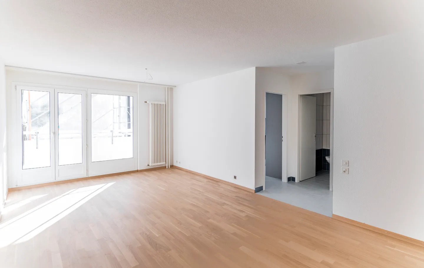 APPARTEMENT AVEC BALCON ET ACCÈS AU LIFT RÉNOVATION - Photo 5 sur 12
