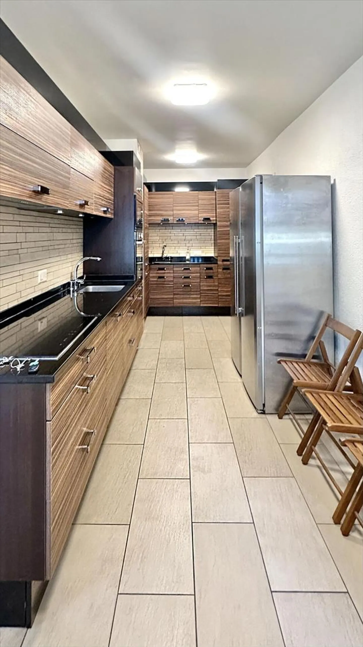 Appartement 7 pièces - Photo 12 sur 13