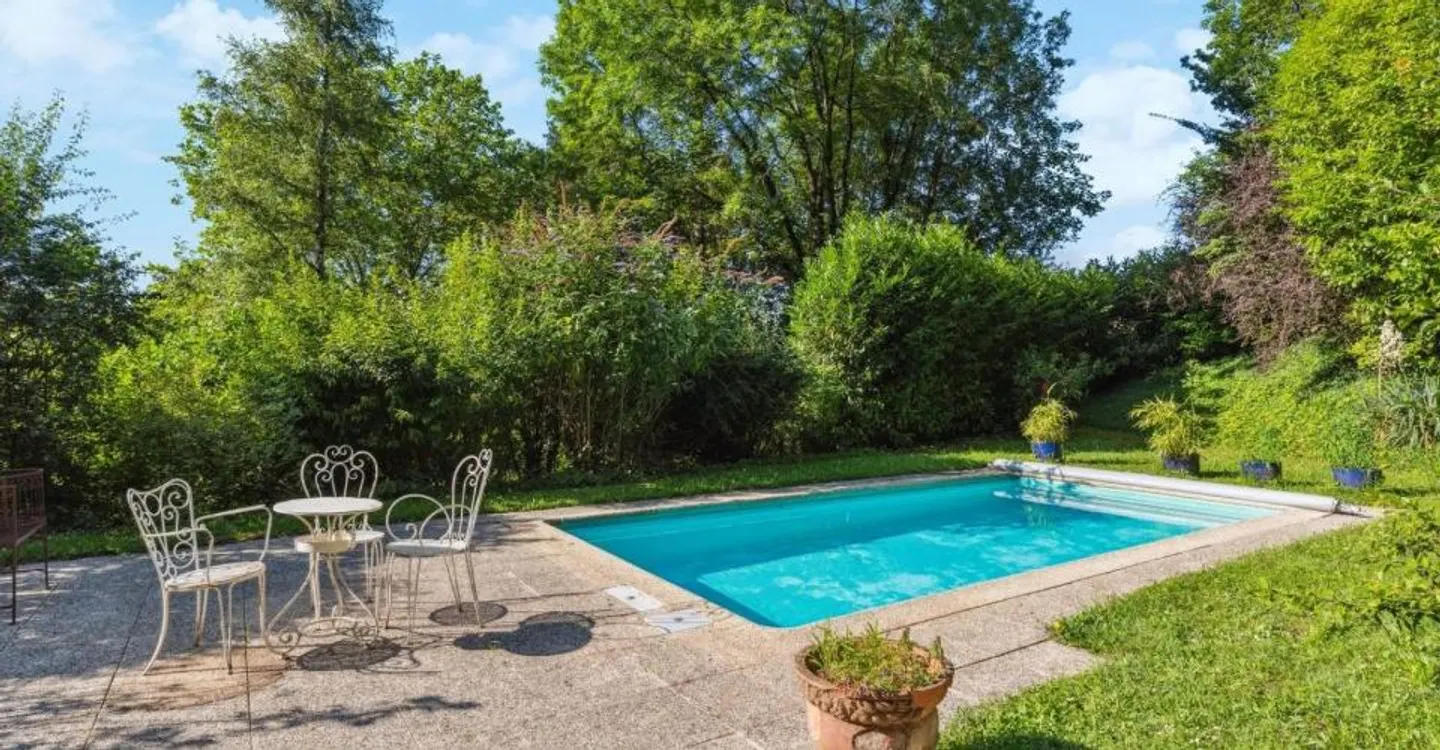 HOUSE WITH POOL IN THE HEART OF A BUCOLIC SETTING, WITH A VIEW OF THE LAKE - Photo 9 of 13