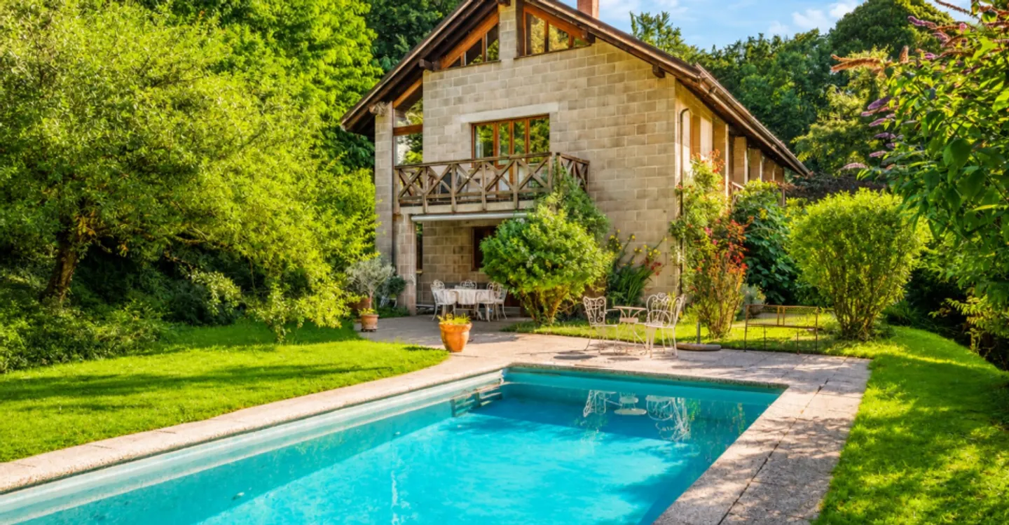 HOUSE WITH POOL IN THE HEART OF A BUCOLIC SETTING, WITH A VIEW OF THE LAKE - Photo 1 of 13