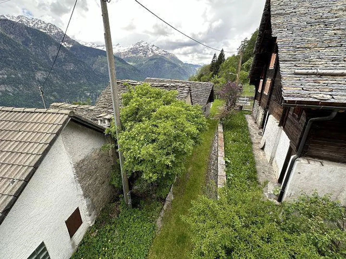 Maison de 3 familles dans un emplacement très calme et ensoleillé avec vue - Photo 27 sur 34
