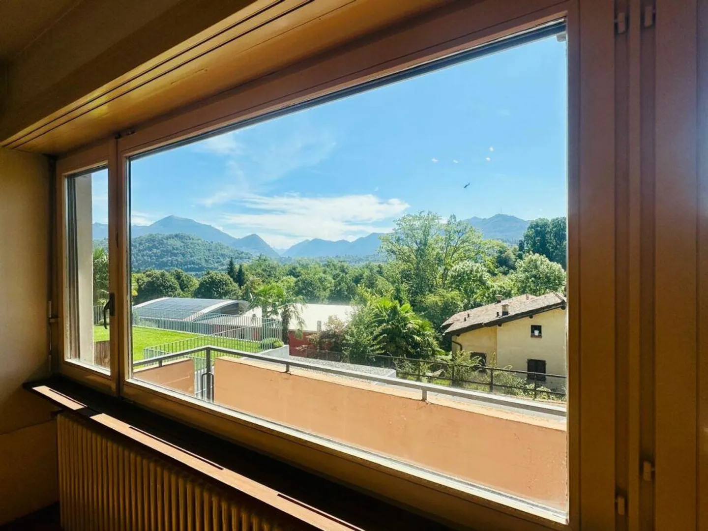 AGNO · DOPPELHAUSHÄLFTE MIT GARTEN IN EINEM WOHNGEBIET - Foto 8 von 11