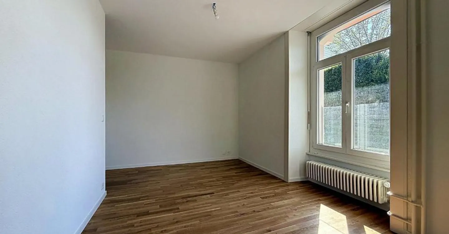 Charmant logement de 4 pièces au rez-de-chaussée - Photo 5 of 7