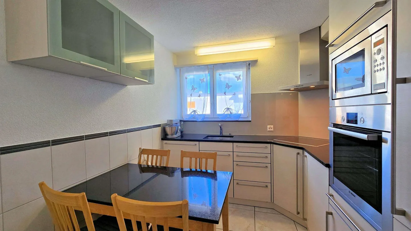 Propriété parfaitement entretenue dans un quartier populaire - Photo 4 sur 12