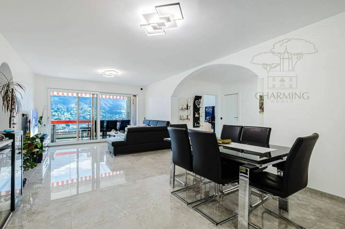 Penthouse mit Seeblick in Porza - Foto 3 von 13