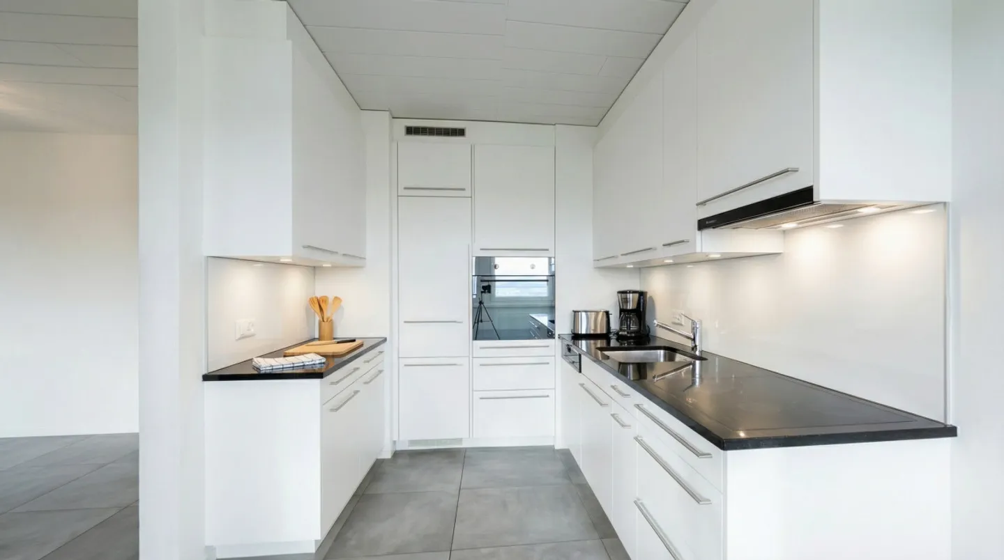 Charmante Dachgeschosswohnung mit Seeblick - Foto 3 von 10