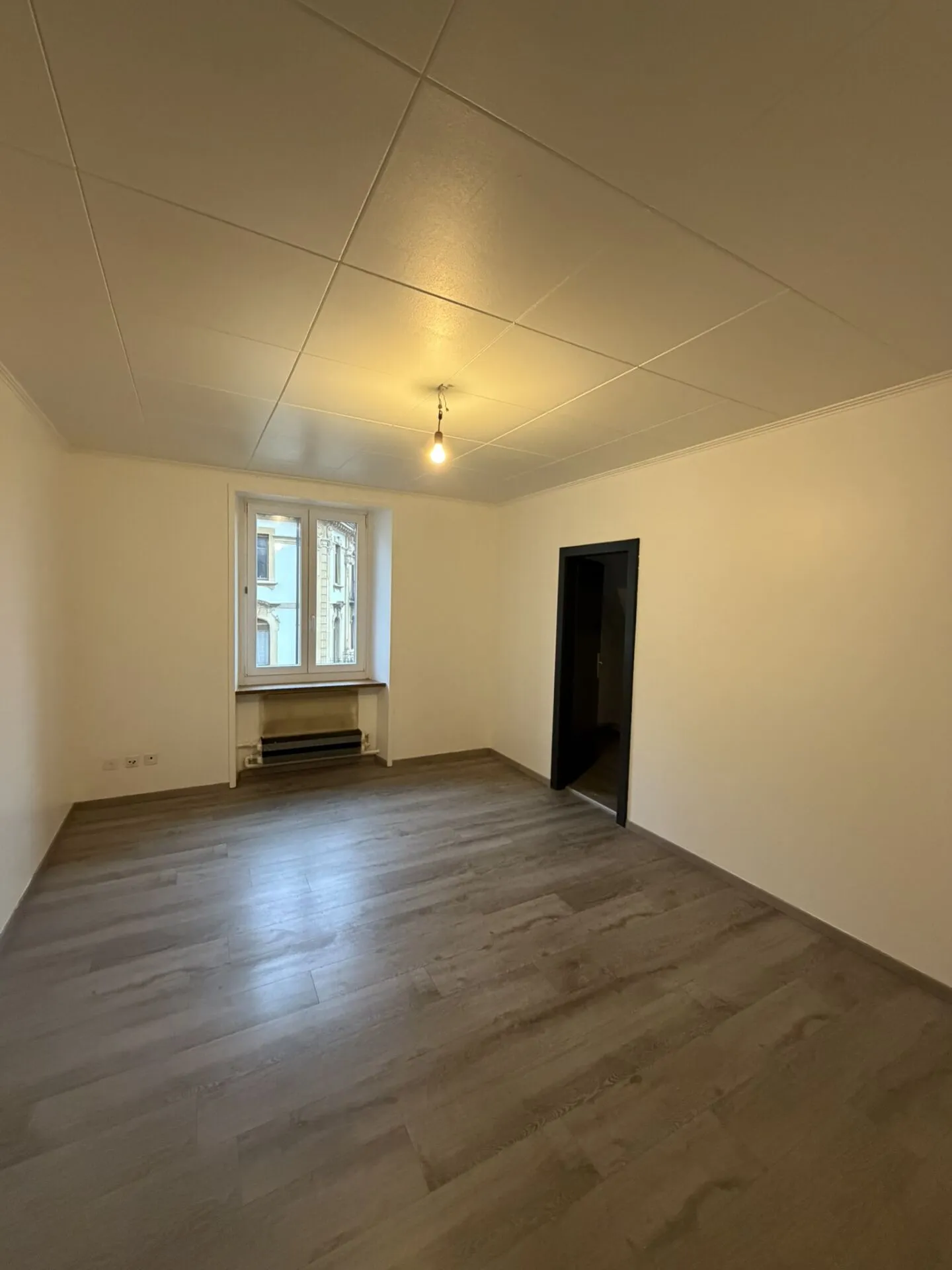 Appartement rénové à Chaux-de-Fonds - Photo 1 sur 6