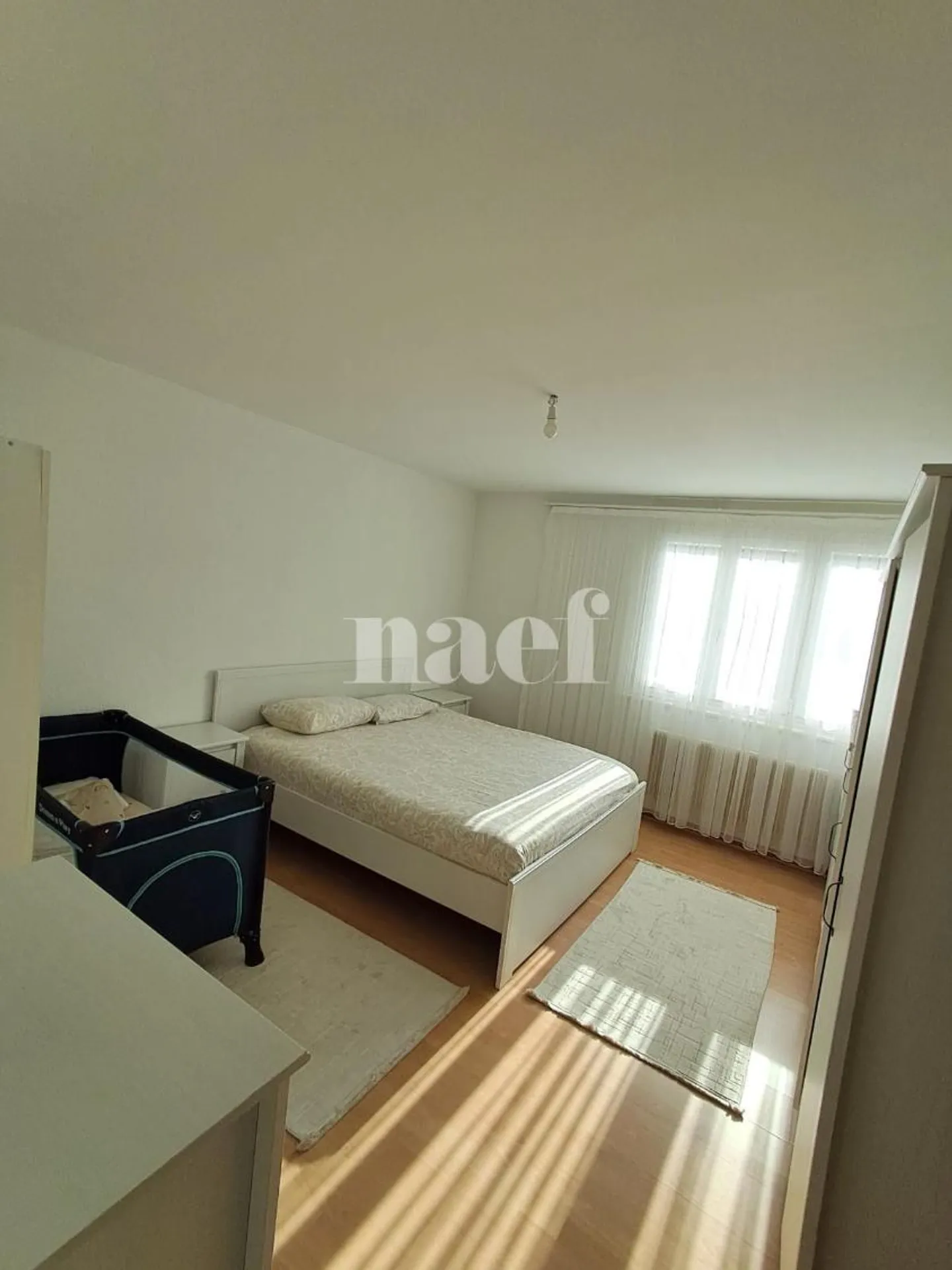 Appartement de trois pièces au 2ème étage - Photo 3 sur 9