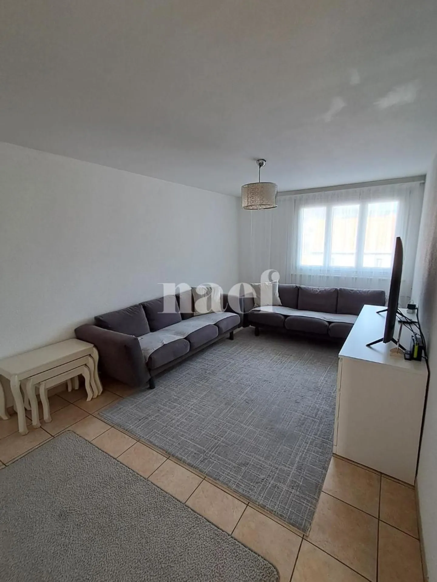 Appartement de trois pièces au 2ème étage - Photo 4 sur 9