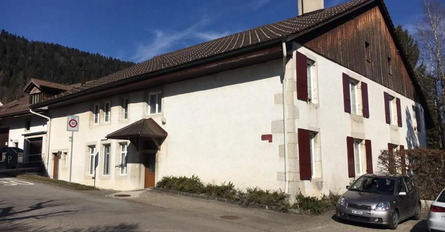 Charmante und moderne Wohnung im 1. Stock eines Dorfhauses - Foto 1 von 9