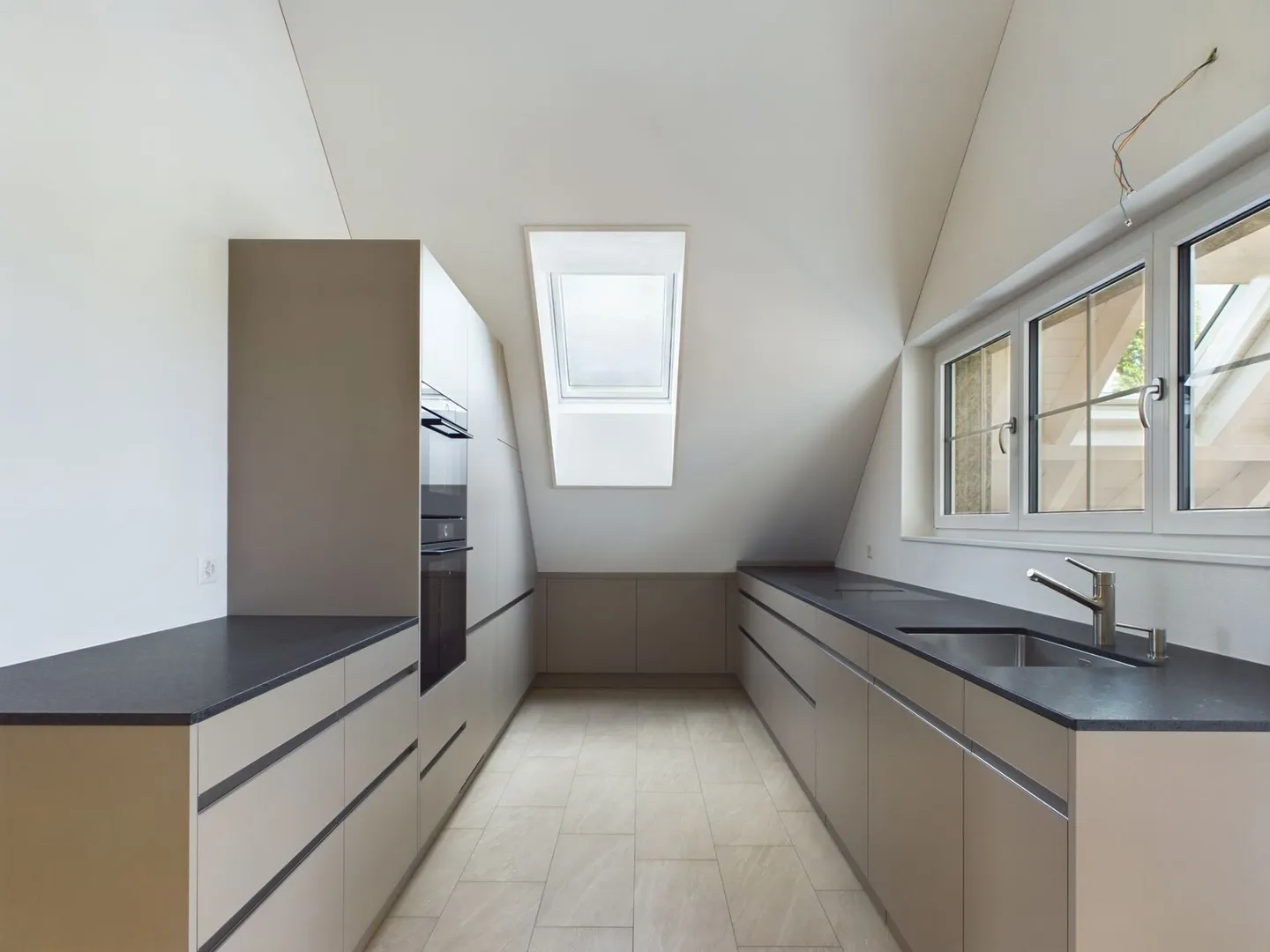 Modernes Penthouse mit Seeblick - Foto 3 von 15