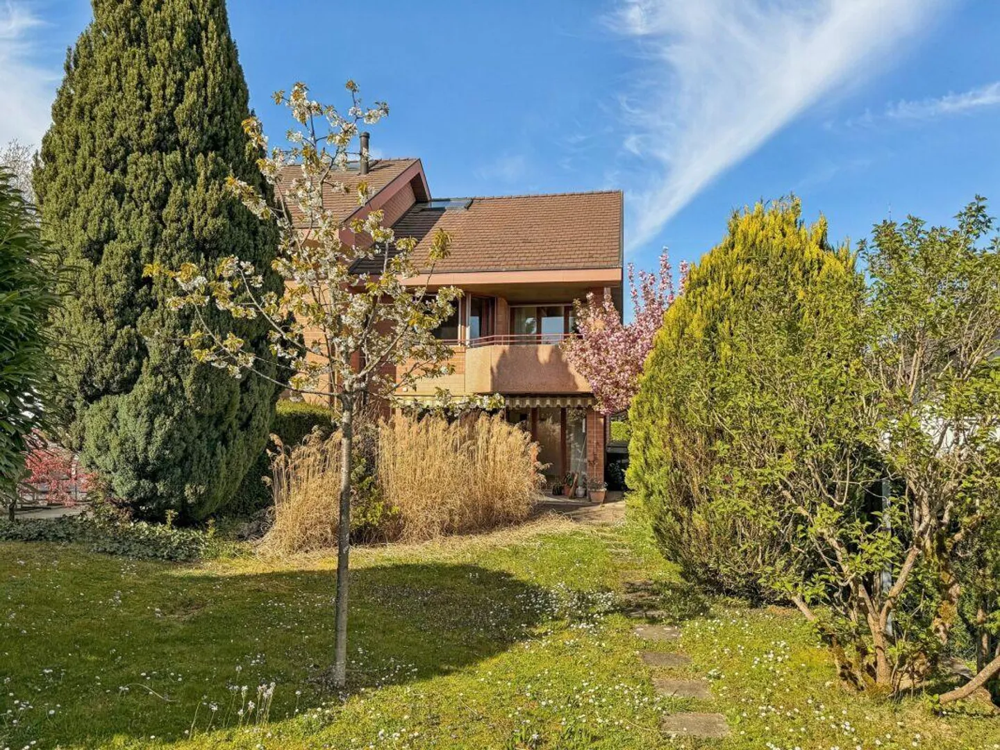 Charmante maison individuelle avec jardin - Photo 1 sur 16
