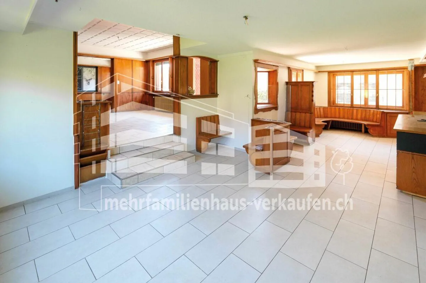 Maison multifamiliale avec bâtiment annexe - Photo 5 sur 13