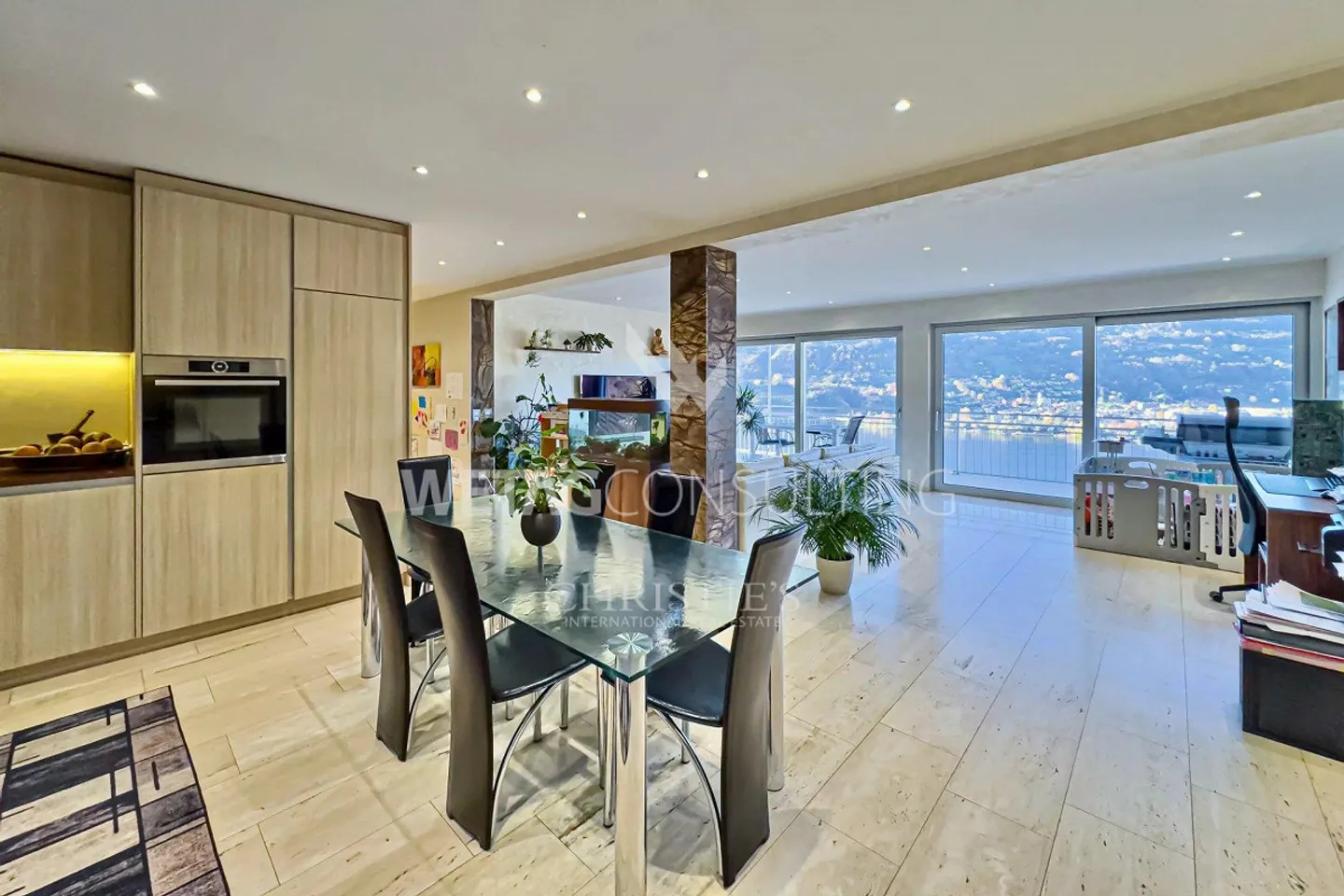Ampia terrazza panoramica e vista mozzafiato sul lago: moderno appartamento attico in vendita a Montagnola - Foto 3 di 12