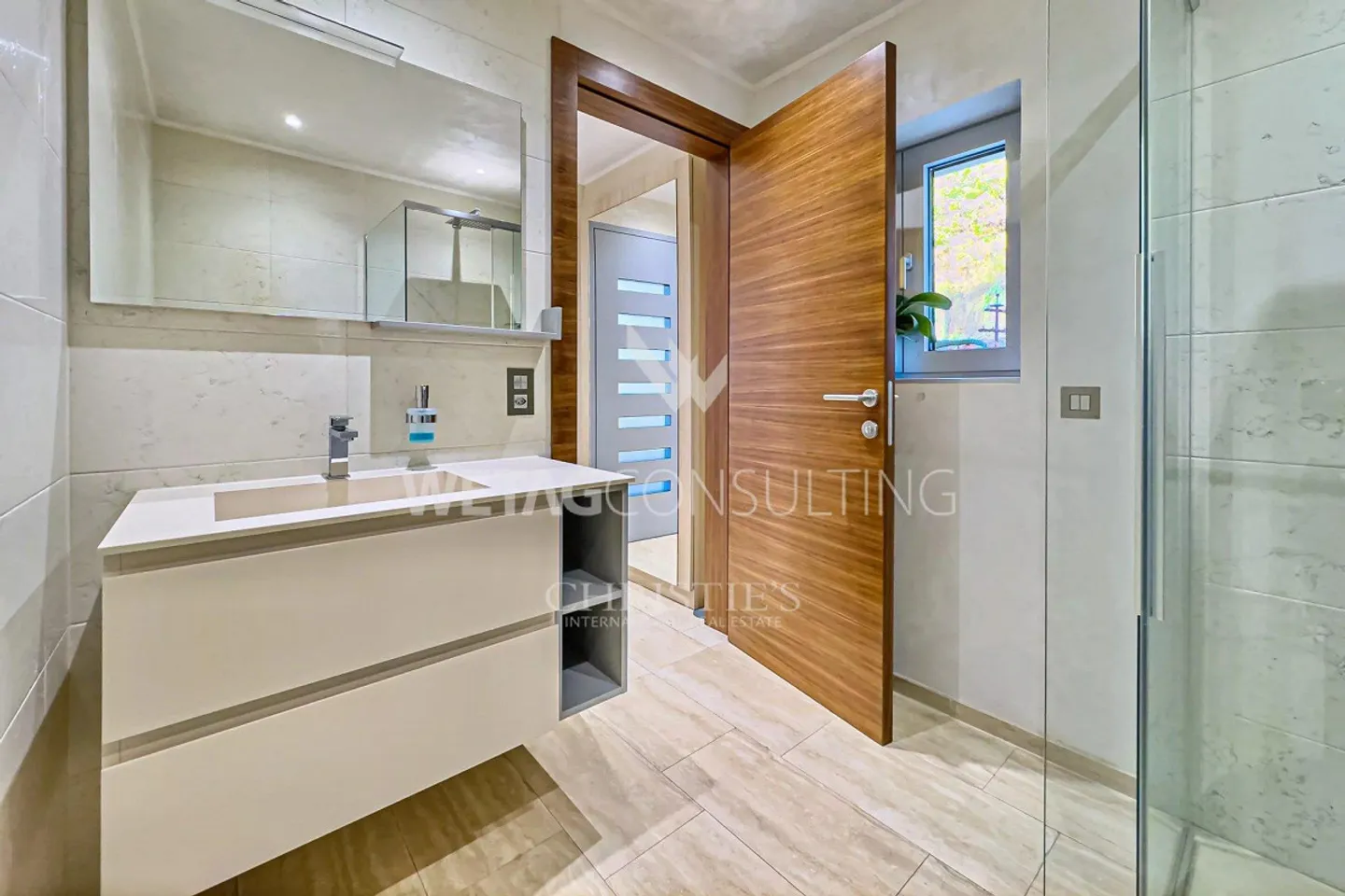 Ampia terrazza panoramica e vista mozzafiato sul lago: moderno appartamento attico in vendita a Montagnola - Foto 5 di 12