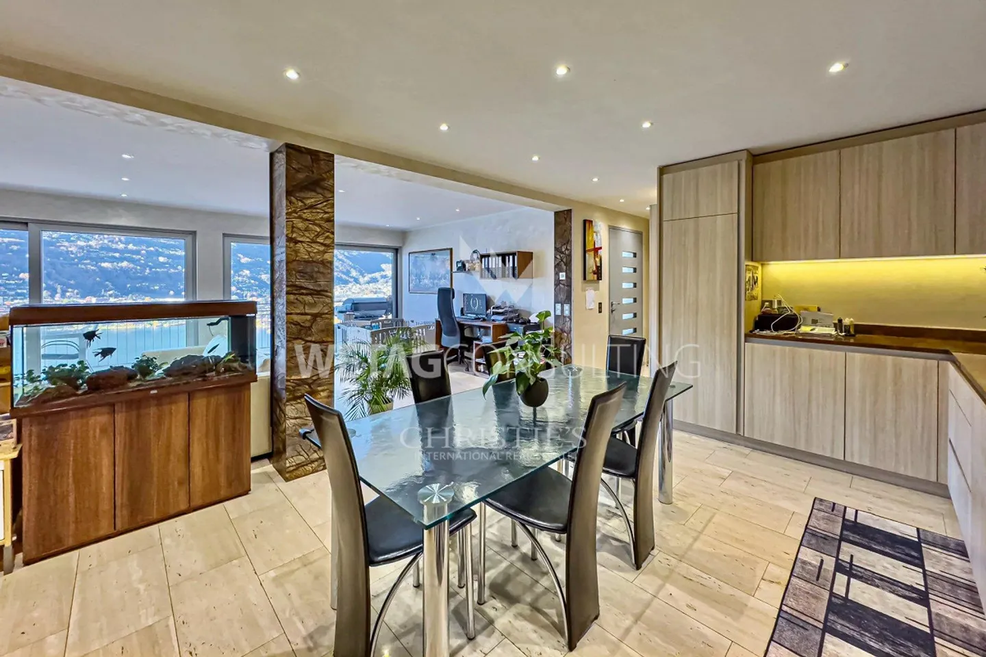 Ampia terrazza panoramica e vista mozzafiato sul lago: moderno appartamento attico in vendita a Montagnola - Foto 7 di 12
