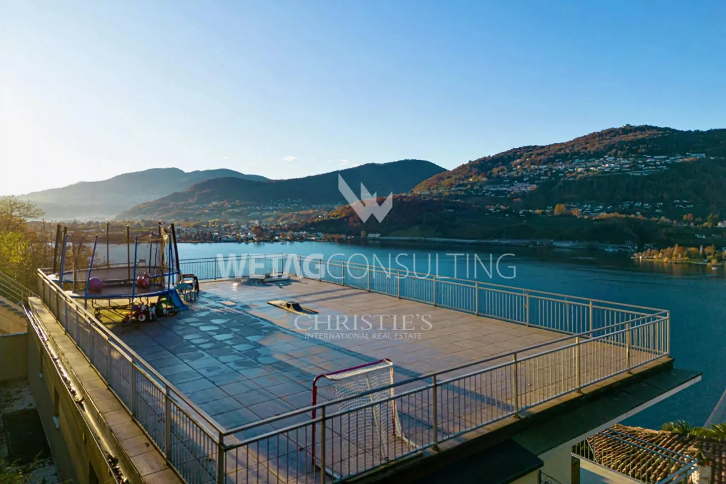 Ampia terrazza panoramica e vista mozzafiato sul lago: moderno appartamento attico in vendita a Montagnola - Foto 9 di 12
