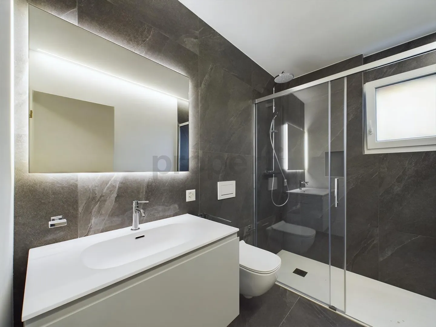 Helles 2,5-Zimmer-Appartement mit Garten in neuer Bauweise in Lumino - Foto 5 von 7