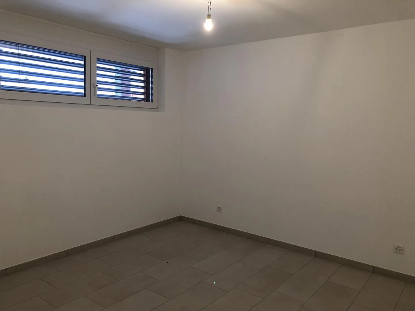 Appartement 2,5 pièces - Photo 3 sur 4