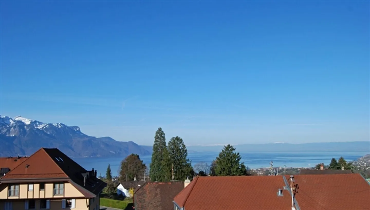 Charmante Dachwohnung mit Seeblick - Foto 4 von 13