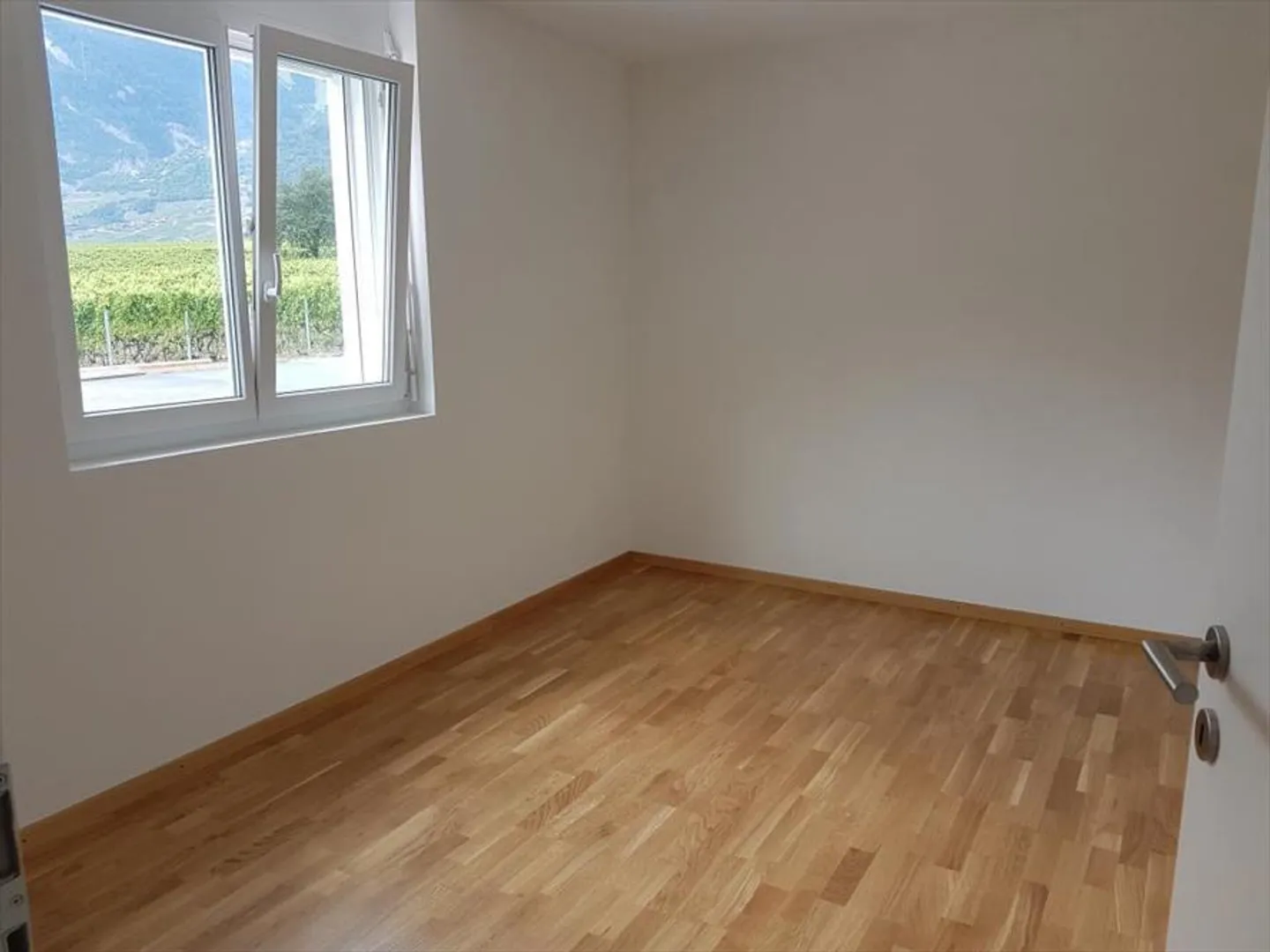 In affitto a St-Pierre-de-Clages, affascinante appartamento 3.5 al piano terra con terrazza - Foto 2 di 8