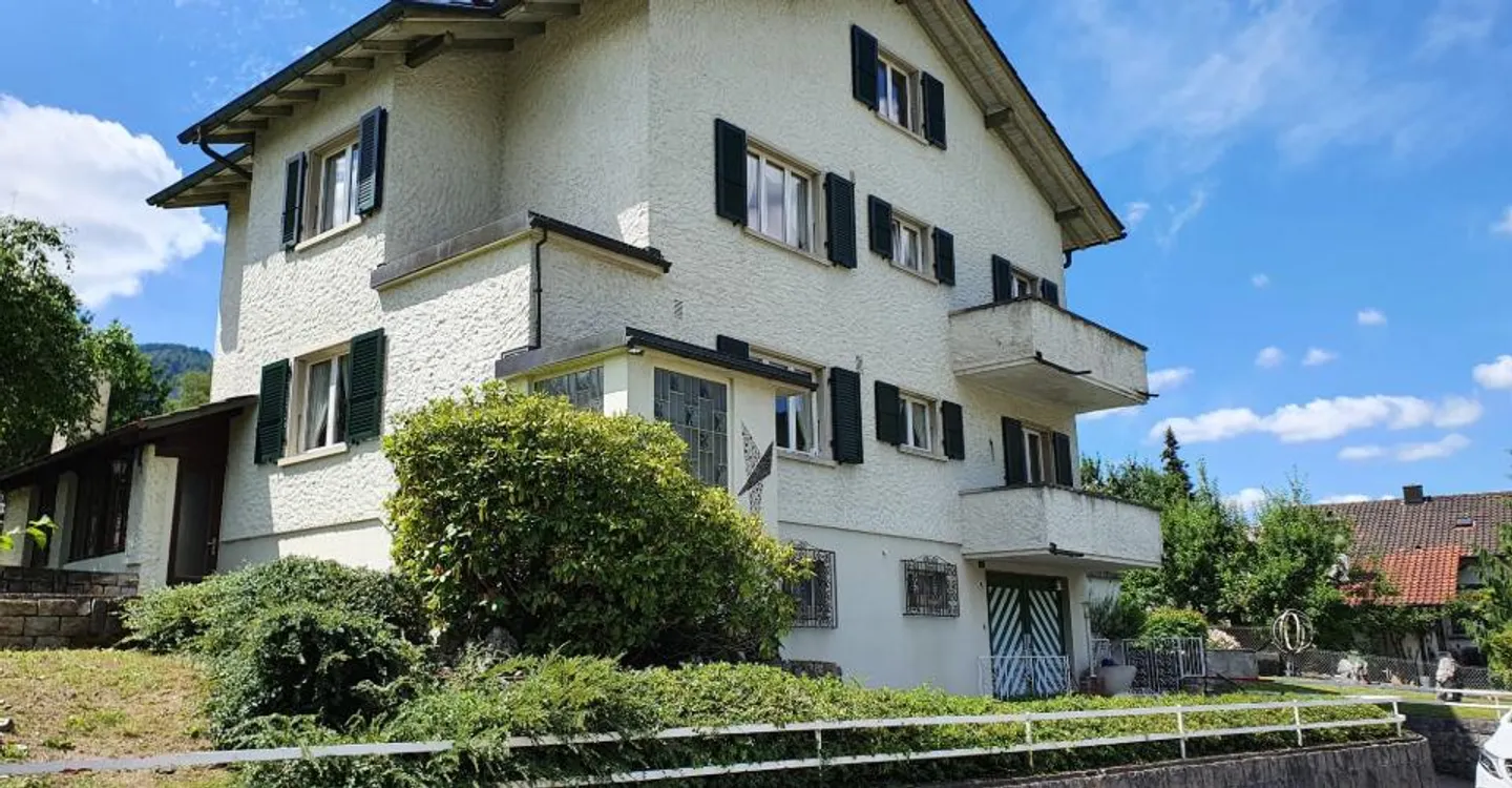 Vielseitiges Mehrfamilienhaus - Foto 1 von 24