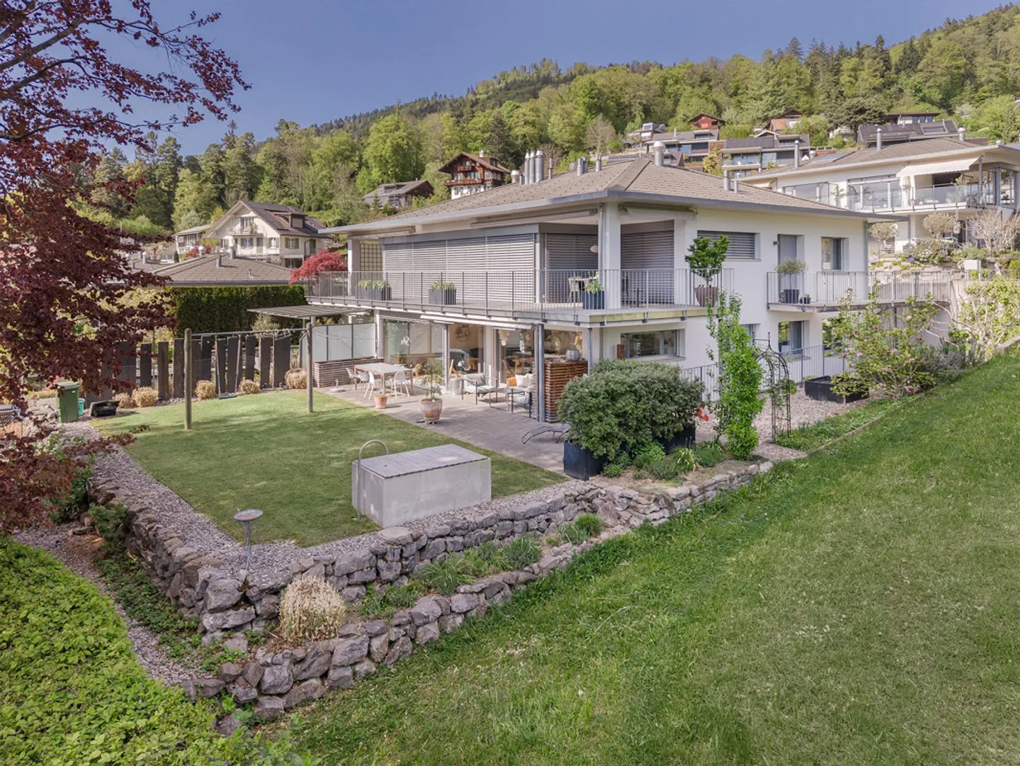 Moderne Gartenwohnung mit Seesicht - Foto 1 von 15