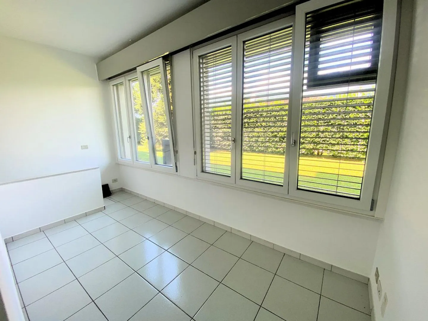 Cozy 1.5-room apartment on the ground floor in Vezia - Photo 2 of 7