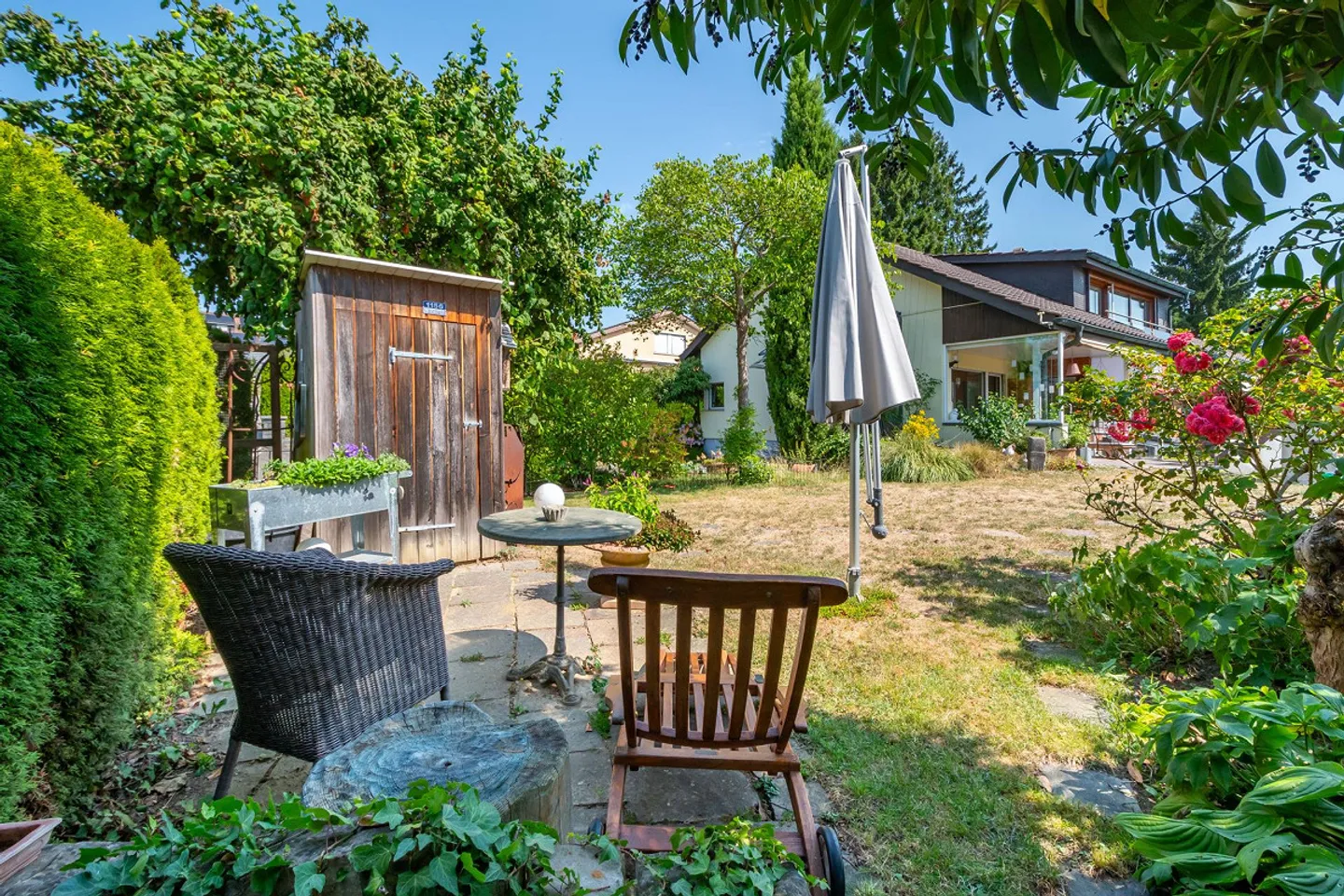 Einfamilienhaus mit Einliegerwohnung und wunderschönem Garten - Photo 6 of 34