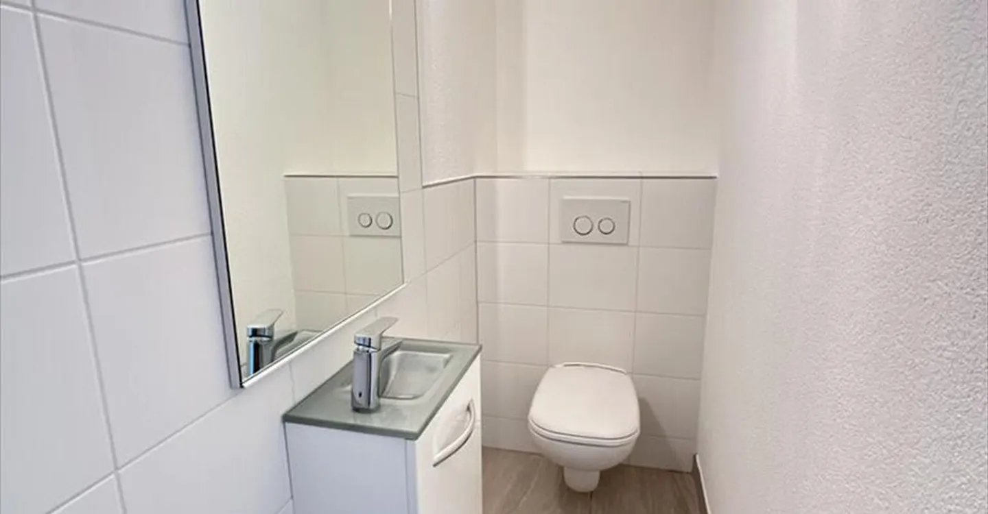 Immeuble d'appartements rénové - Photo 4 sur 12