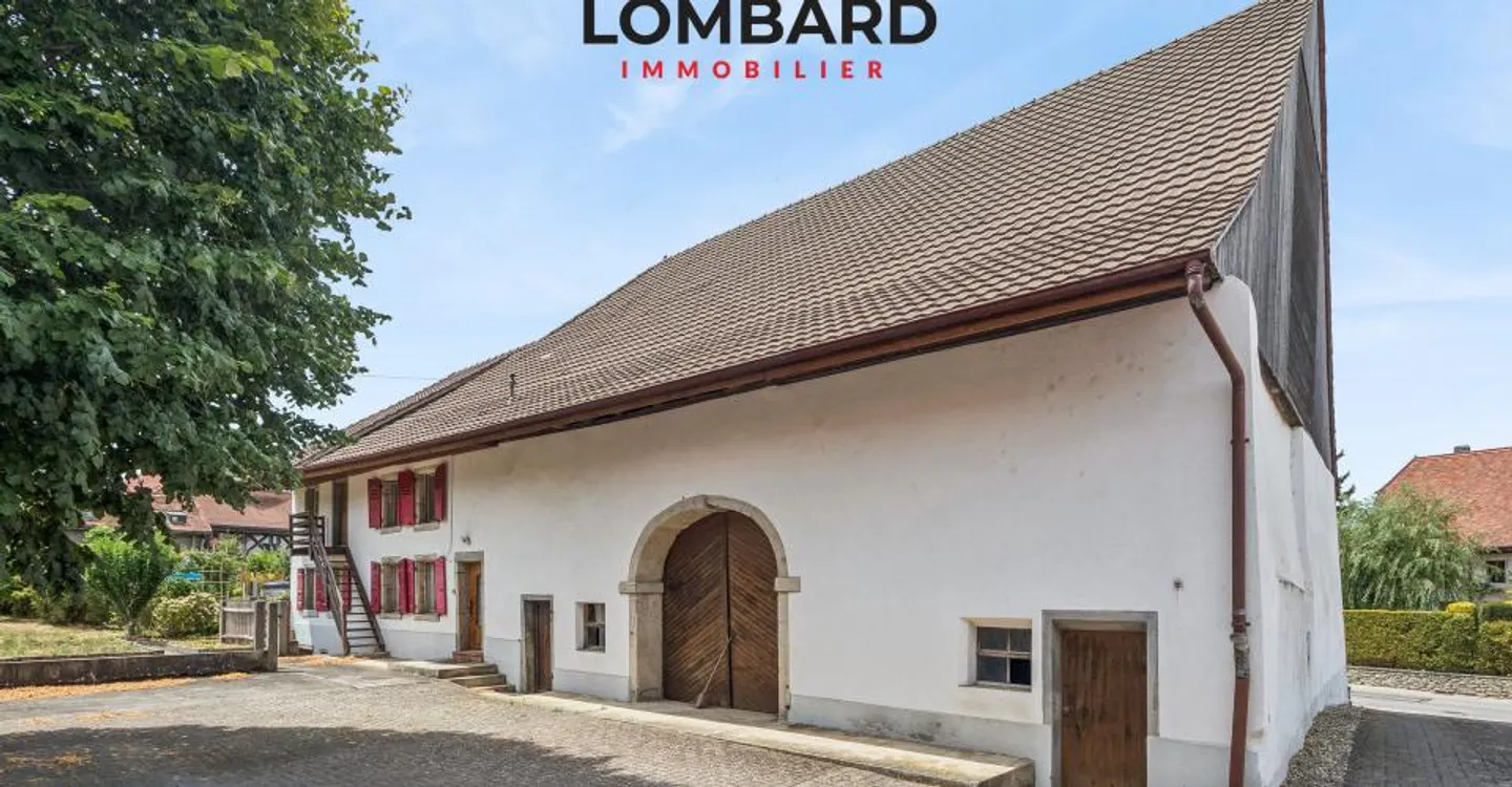 A character property in the heart of Châbles, between heritage and development potential - Photo 3 of 7