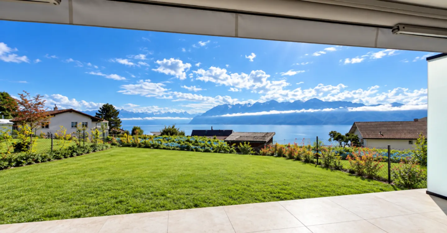 Terrassenwohnung 3,5 Zimmer mit atemberaubendem Blick auf den See und die Berge - Foto 1 von 6