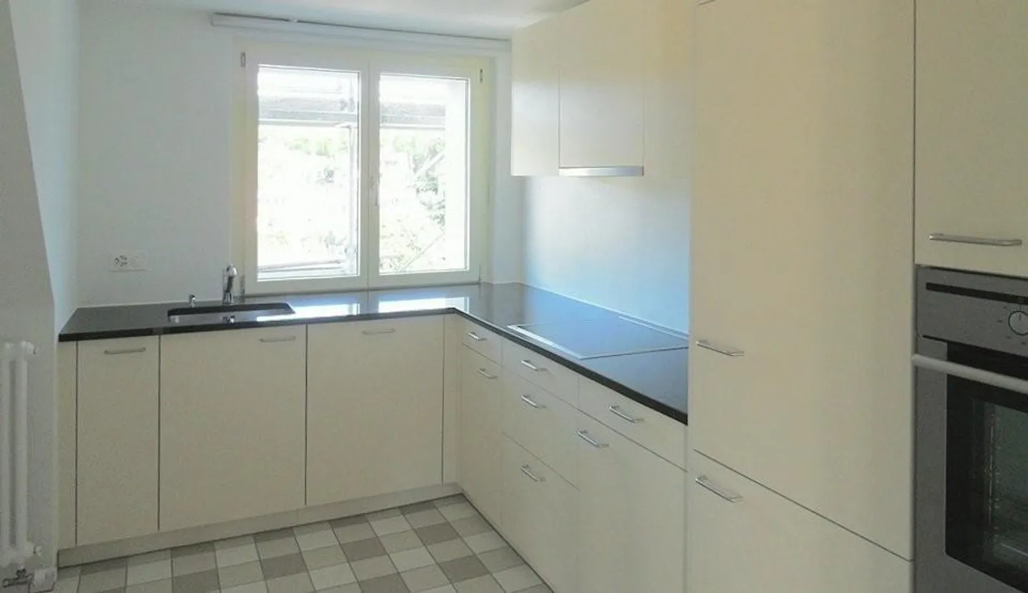 Appartement moderne sous les combles avec charme ancien - Photo 2 sur 7