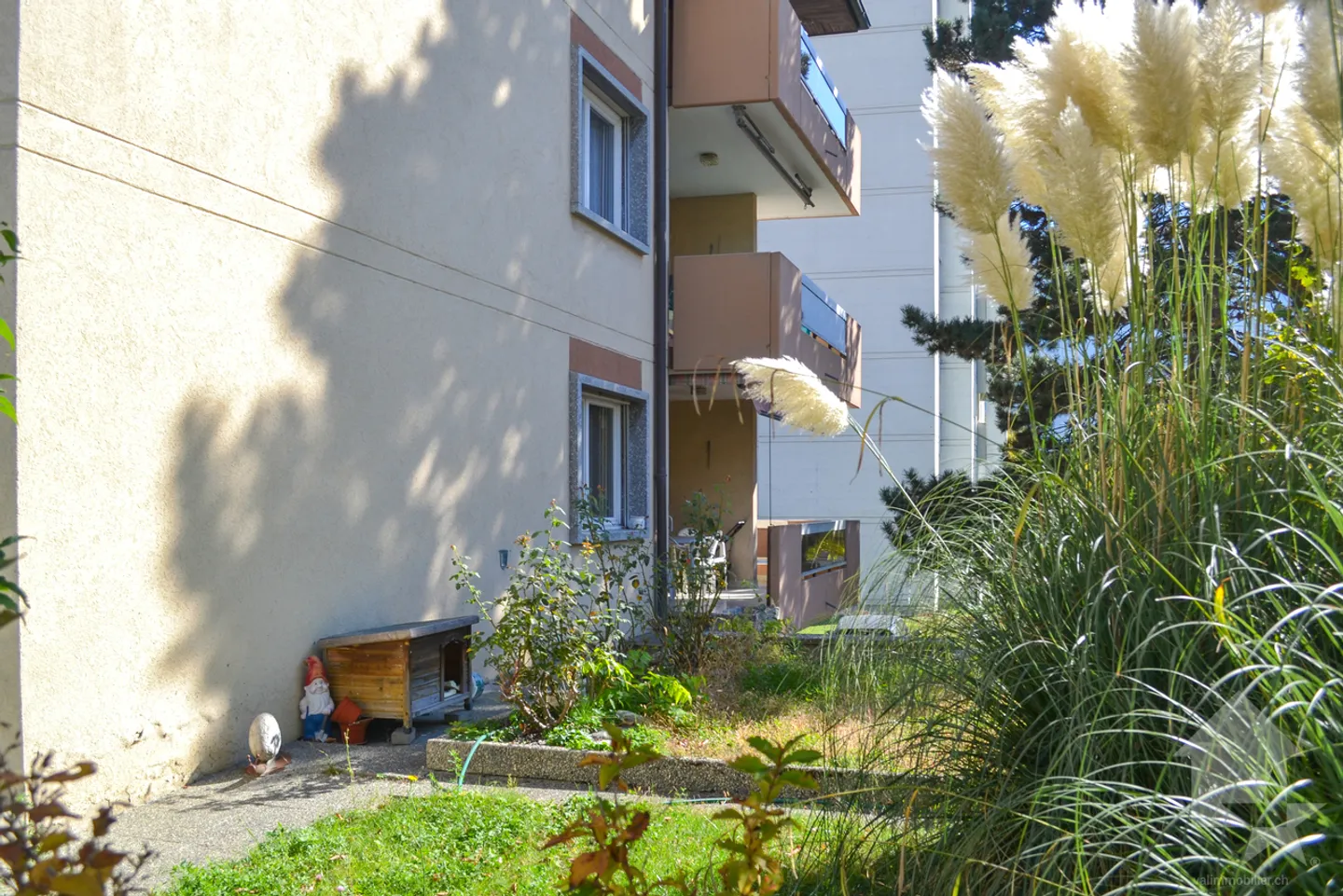 Appartamento 5,5 locali con 2 balconi di 18 m² e giardino privato - Foto 23 di 28