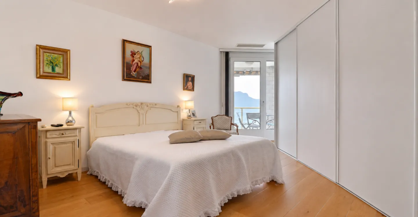 Außergewöhnliches Penthouse mit Panoramablick auf den See und die Berge - Foto 2 von 11