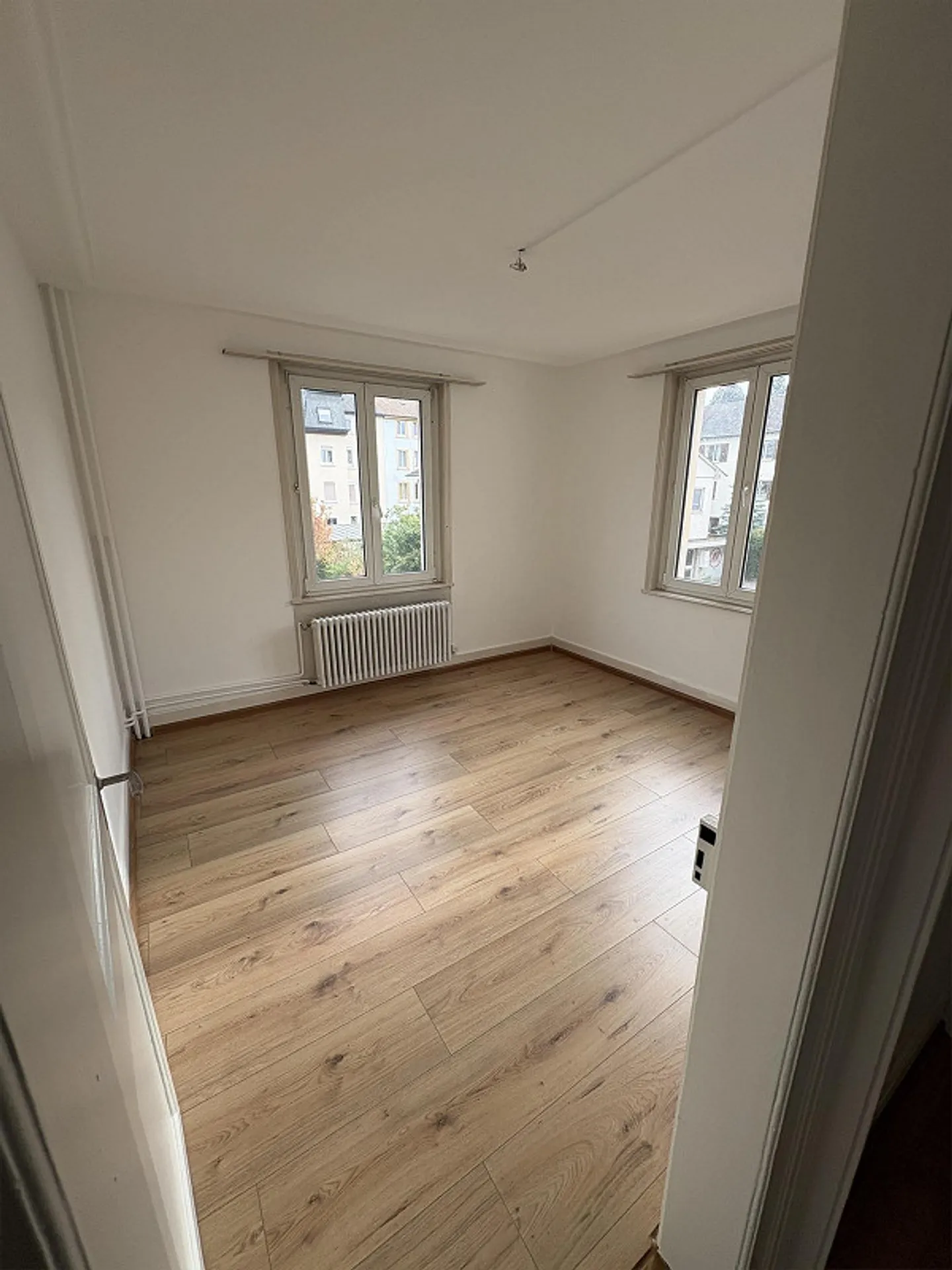 Appartamento duplex 5.5 locali con balcone, giardino e posto auto - Foto 2 di 15