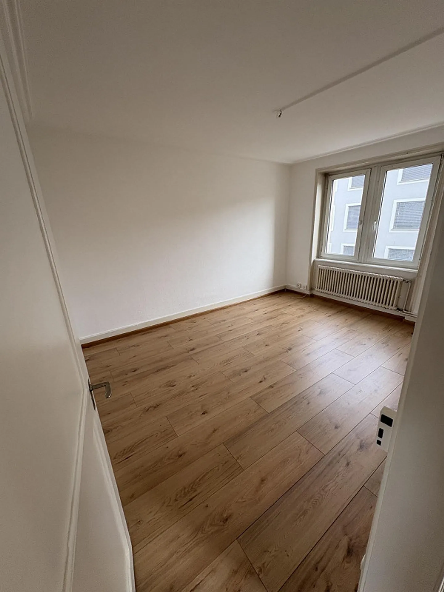 Appartamento duplex 5.5 locali con balcone, giardino e posto auto - Foto 3 di 15